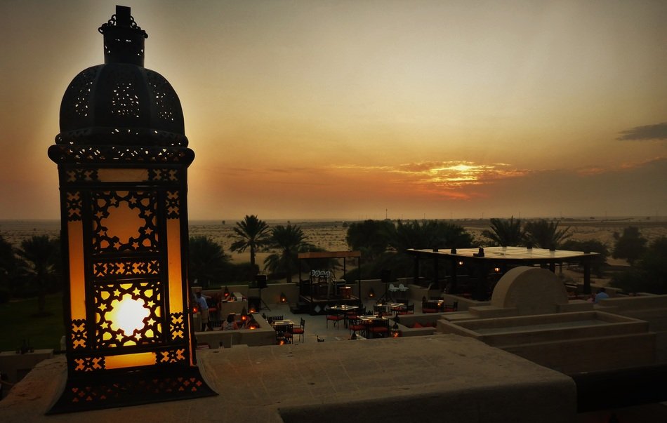 lantern on sand dune background
