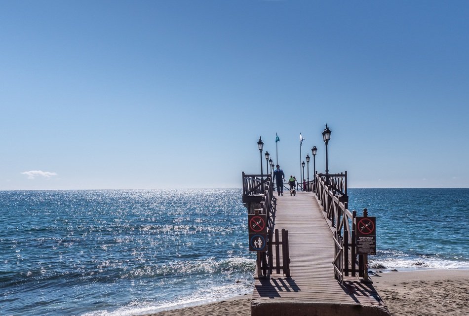 Marbella Pier by the sea on a sunny summer day