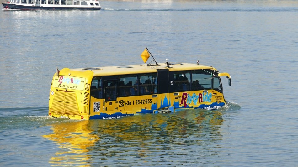 yellow bus for tourists in the Danube