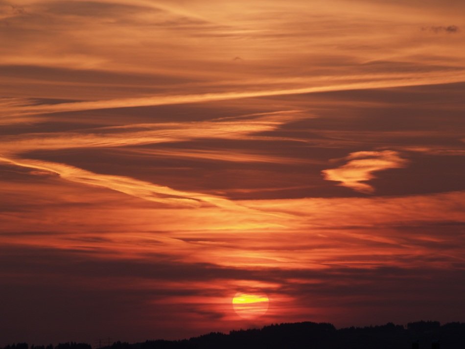 the sun in the evening sky