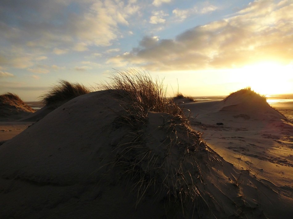 Beautiful landscape with the sunset on the beach of North Sea