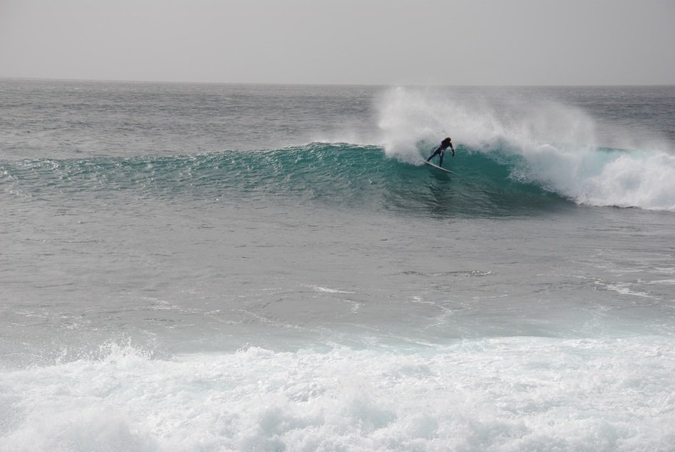 surfer on wave, cape verde, sal