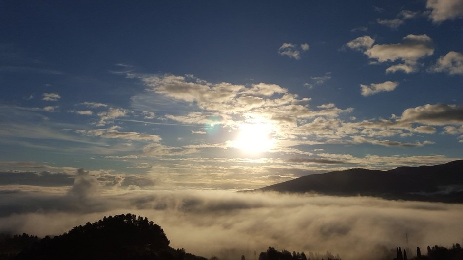 Beautiful and bright sunset among the clouds