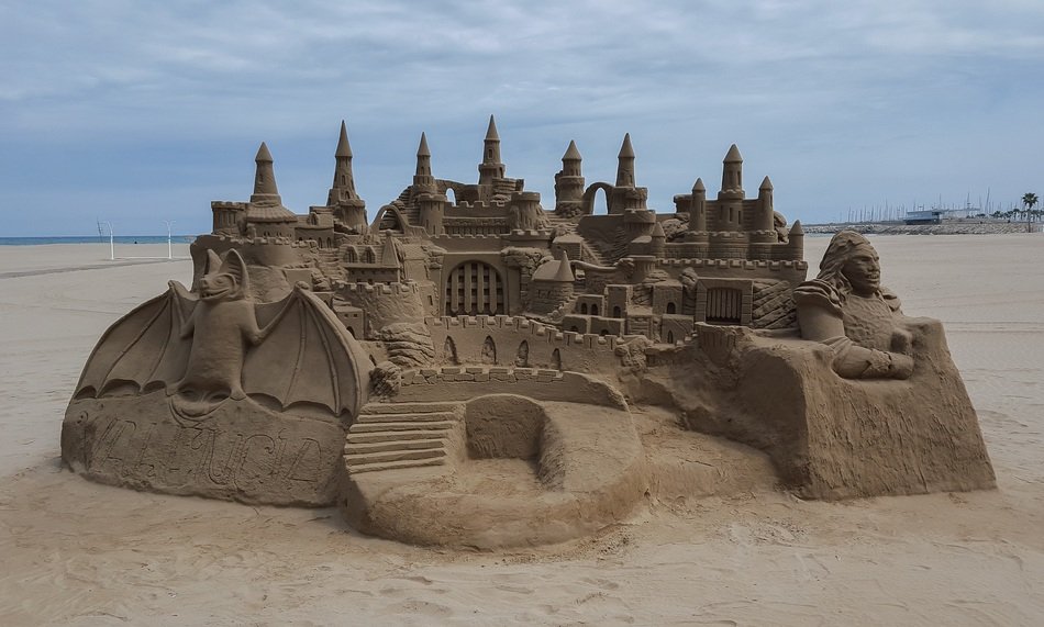 large sand castle on the shore