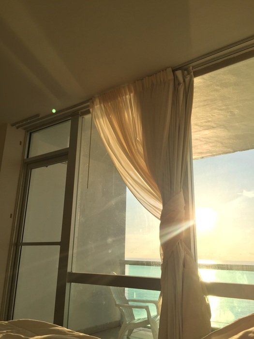 light of the rising sun in the window