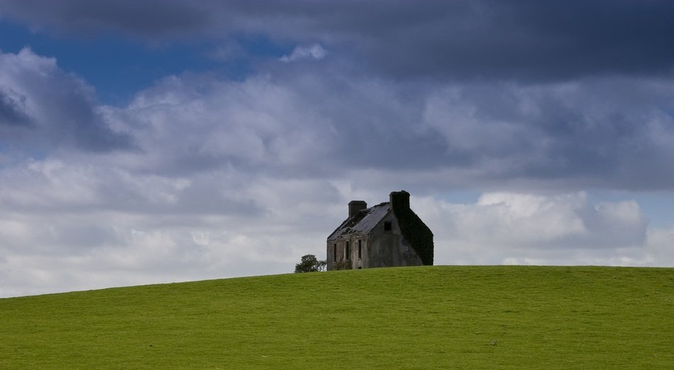 lonely house on a green hill