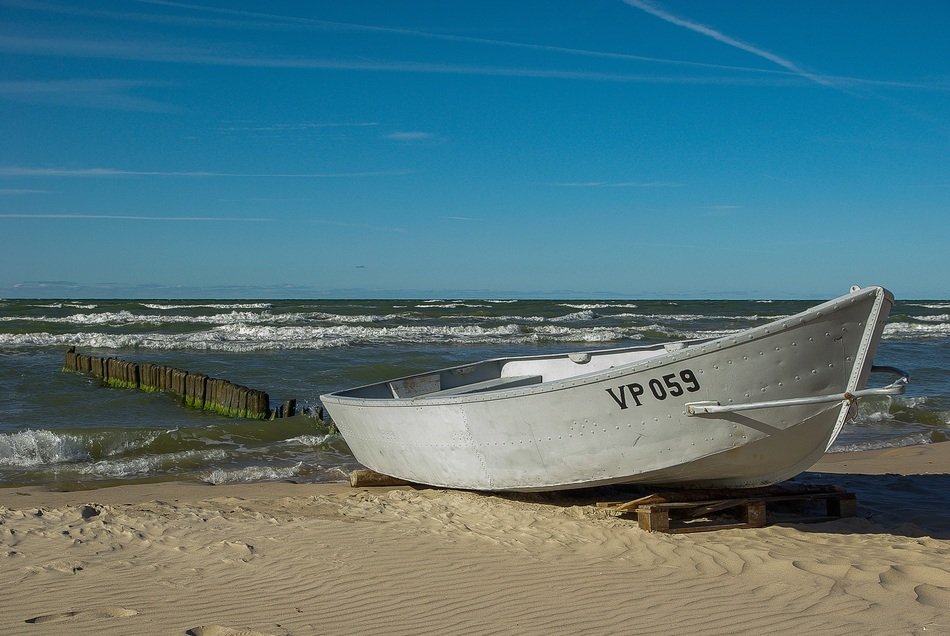 white Boat vp059 on sand