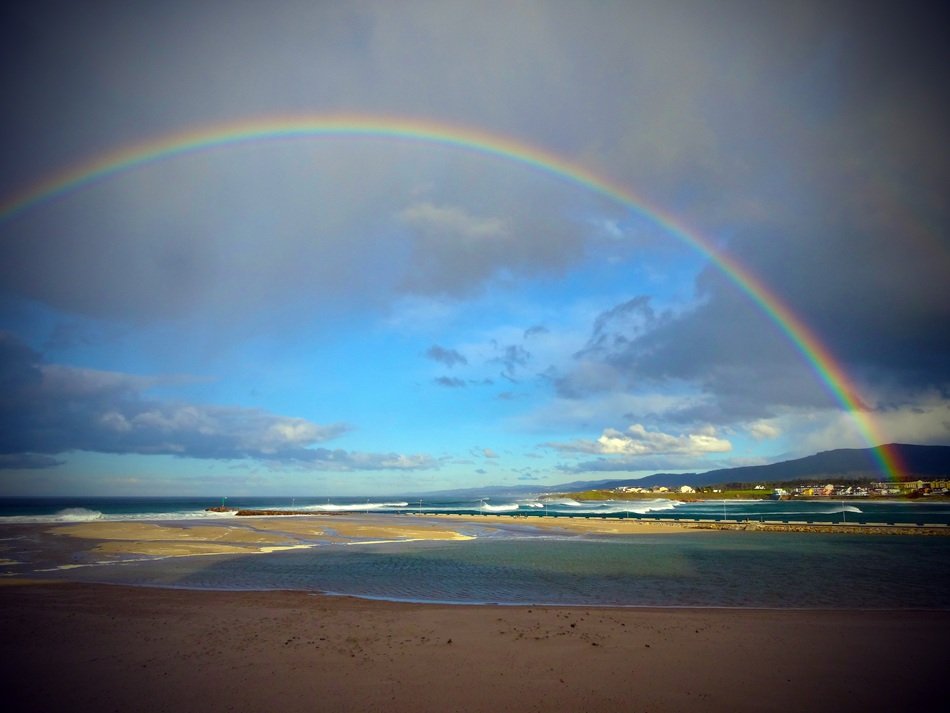 rainbow on the horizon over spain