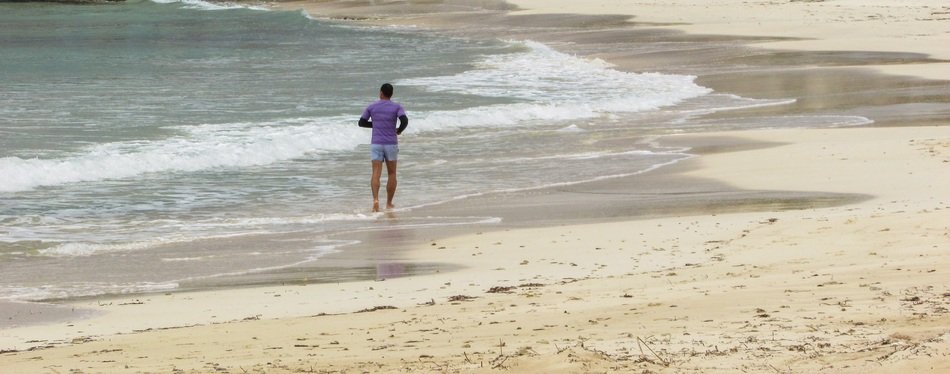 runner on the wide sandy coast