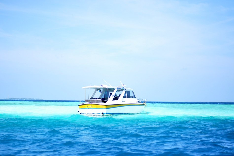 covered Boat on Sea