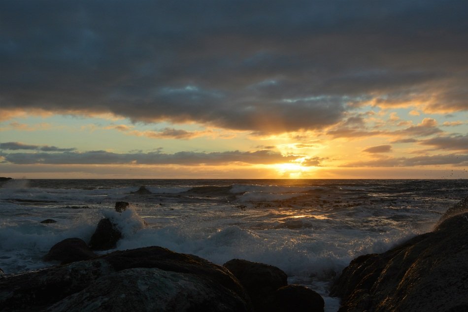 Beautiful seascape with the waves under the sunset