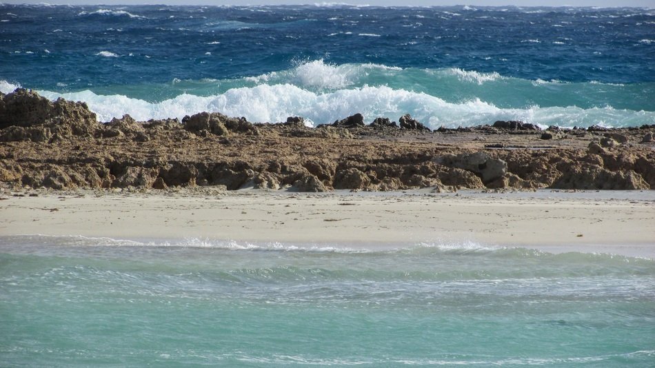 Beach with the waves on the resort