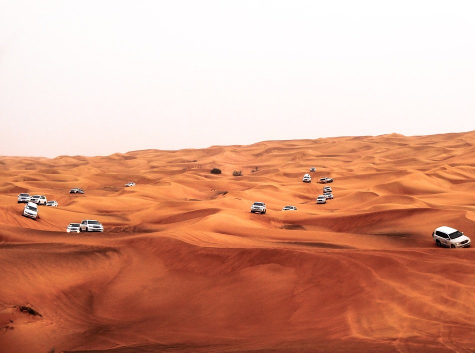 cars in the sand dunes