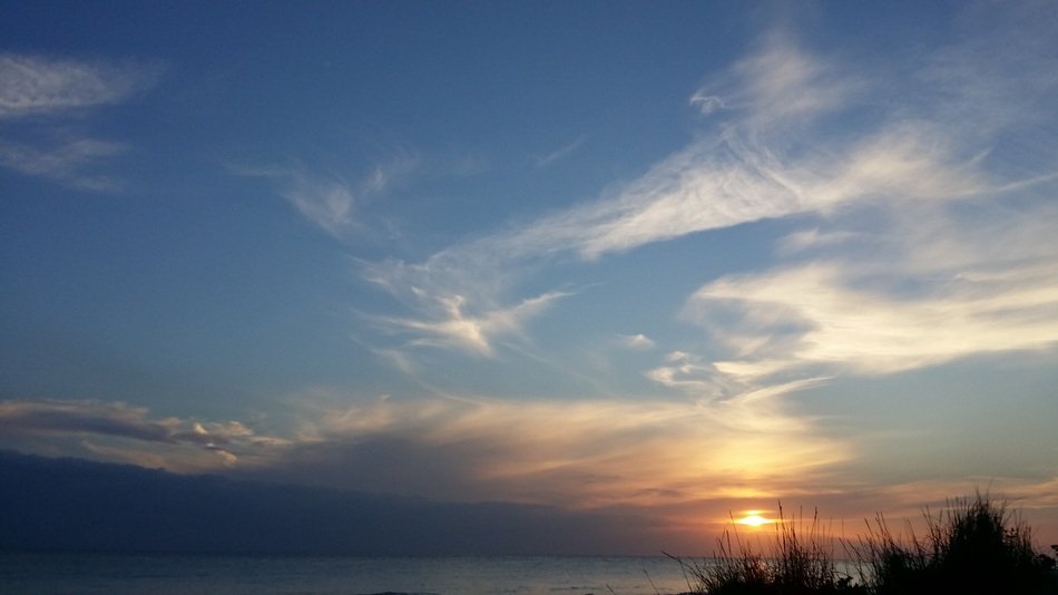 Calm sunset sky over beach