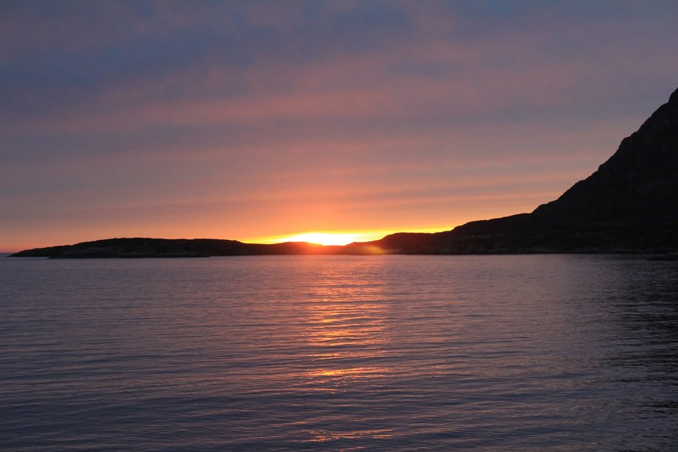 night sky over the waters of greenland