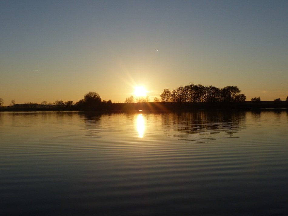 evening sky over still water