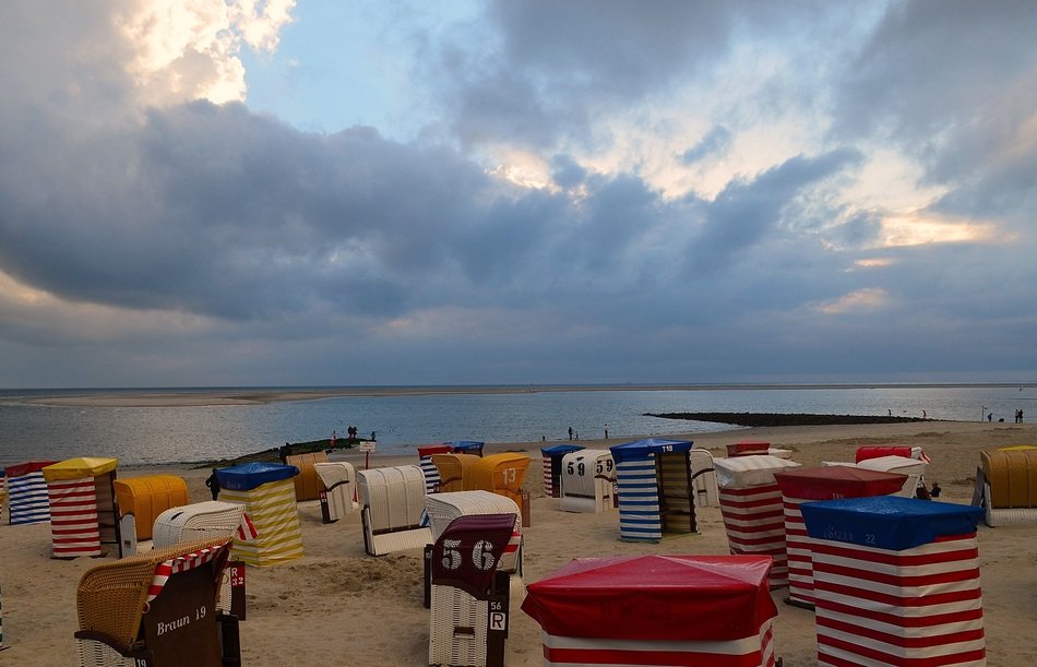 sun loungers on the beach in the evening