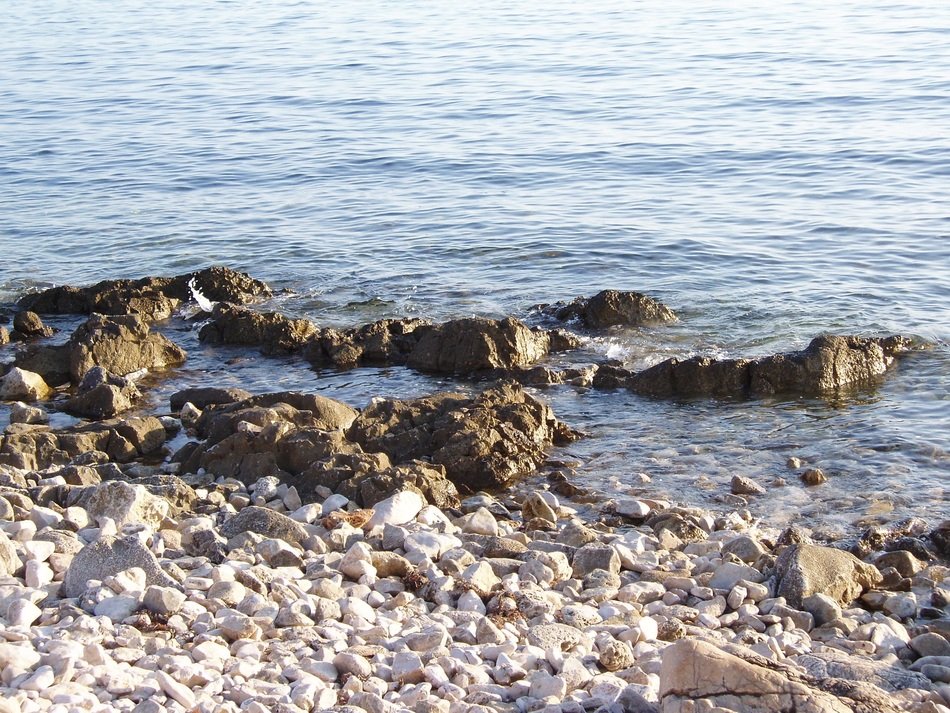 stones on the beach in the mediterranean