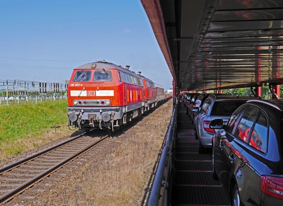 red locomotive on the railway