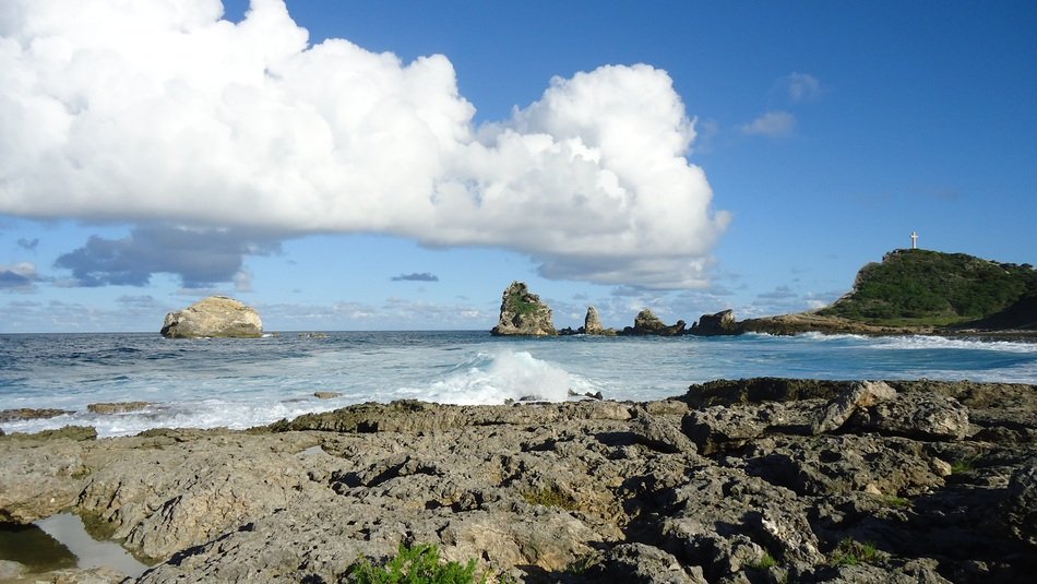 white clouds over the coast in guadeloupe