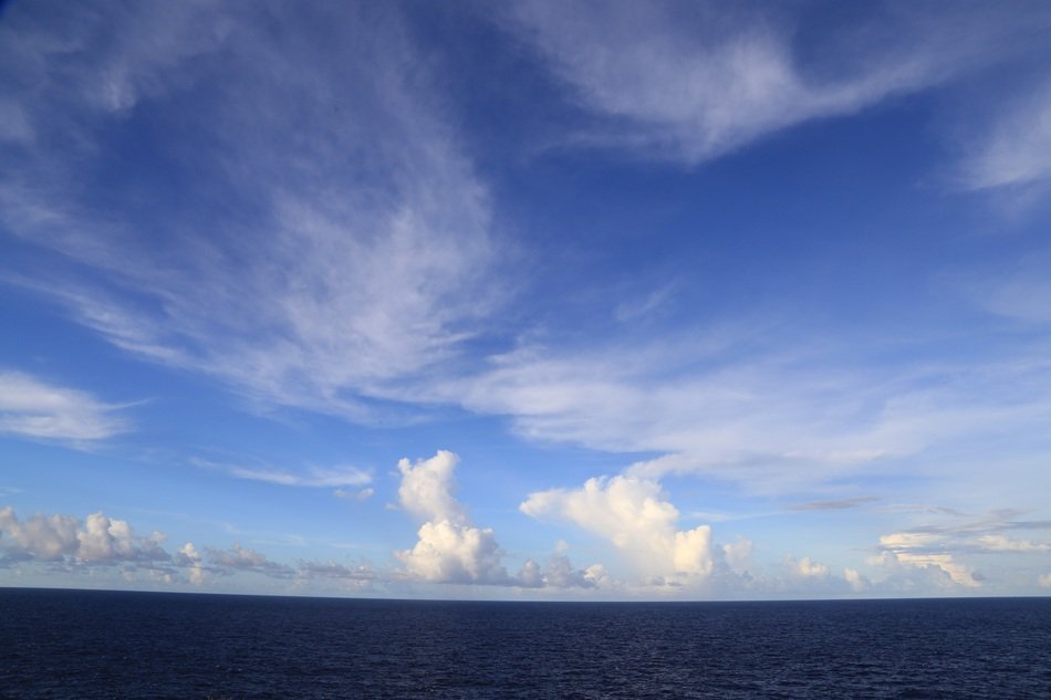 landscape of cloudy bright sky over the ocean