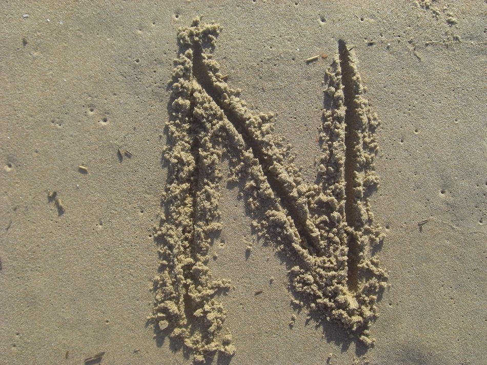 Letter N on the Sand