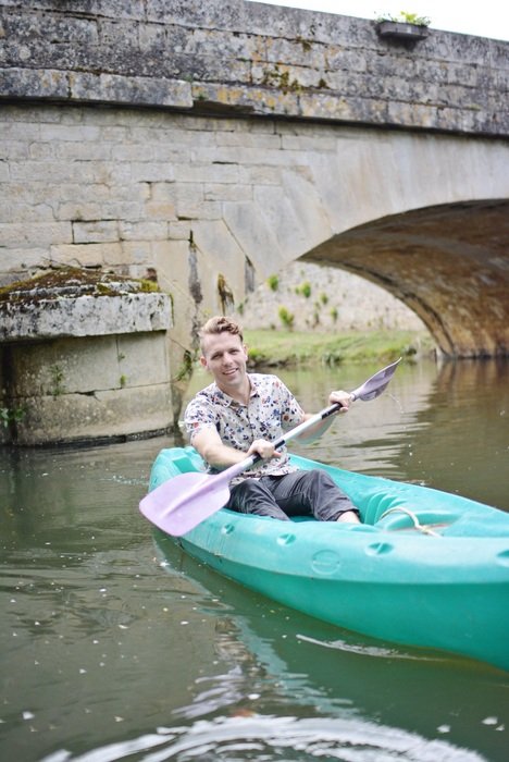 the boy in the blue boat