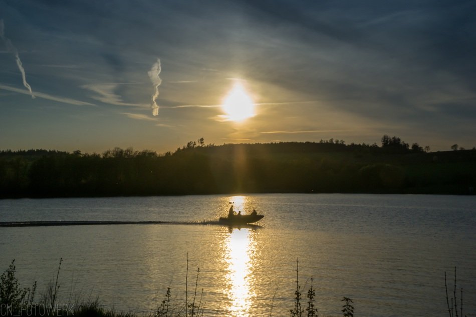 boat ride on the lake in the evening