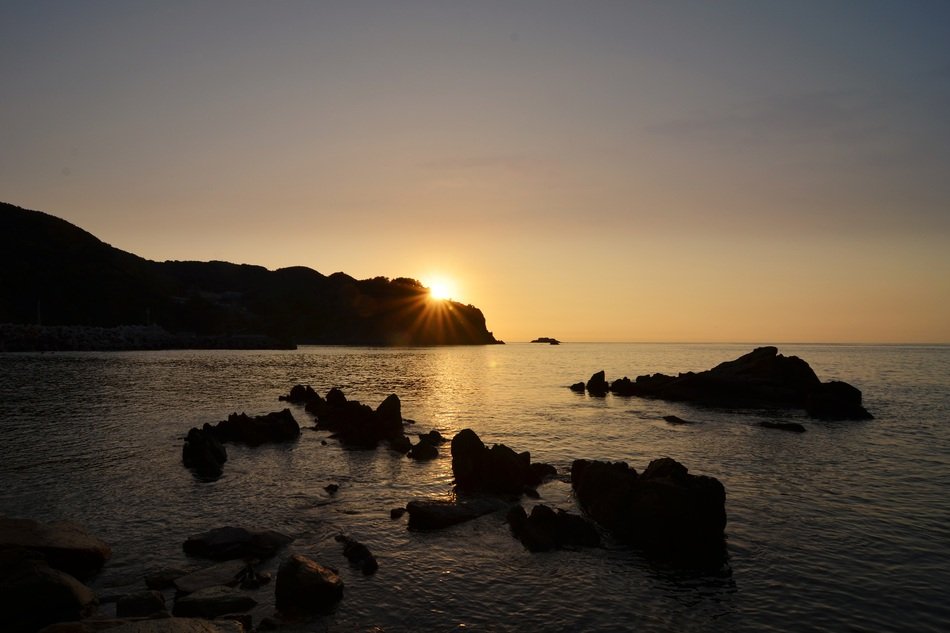 sunrise over the coast of the island