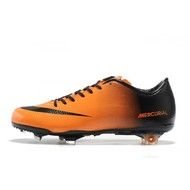 orange black soccer shoes