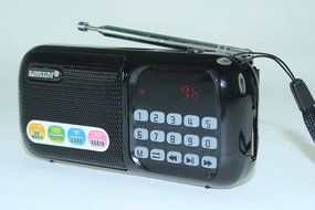 Anncia Mini Digital Media Portable Music MP3 Player Micro SD/TF USB Disk Speaker FM Radio. (69E Red) N102