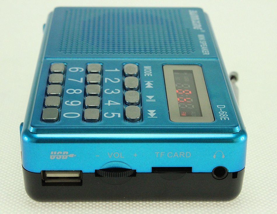 Anncia Mini Digital Media Portable Music MP3 Player Micro SD/TF USB Disk Speaker FM Radio. (69E Red) N85