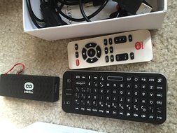 Infinitec's Pocket TV and air remote turns any TV into a smart android TV. N2