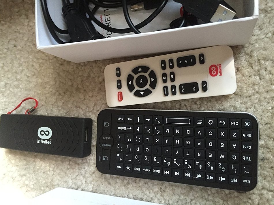 Infinitec's Pocket TV and air remote turns any TV into a smart android TV. N2