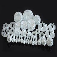 33 piece cake decorating / sugarcraft set with cutters / plungers for flowers / leaf / shapes by Kurtzy TM