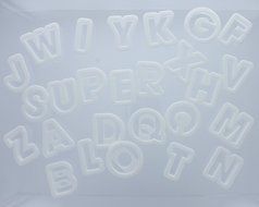 White Plastic Alphabet Cookie Cutters 1 1/2" tall N3