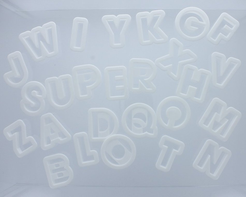 White Plastic Alphabet Cookie Cutters 1 1/2" tall N3
