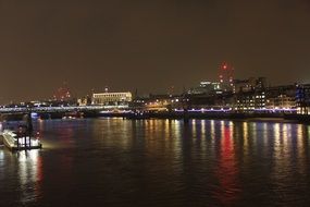 night photo of thames river in London