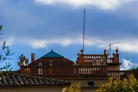 roof of the building against the cloudy sky