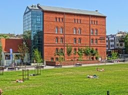 large brick building in the park