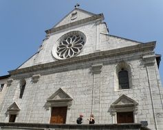 facade of christian cathedral in france at blue sky background