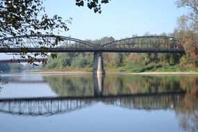 bridge over a bright river in romania