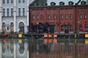 brick building by the river