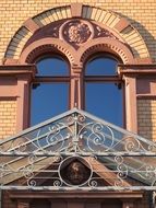 window on the facade of a brick villa