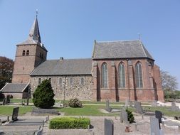 large stone church in the village of Andelst