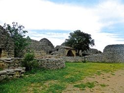 stone as a building material on green grass