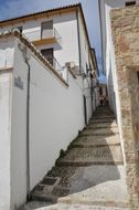 narrow path with steps between the houses, spain