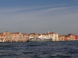 distant view of the ship near the promenade of venice