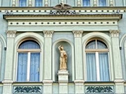 statue as a decoration of a building on the old market square in Bydgoszcz