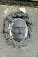 a cast of the face on the monument in the cemetery in Dresden